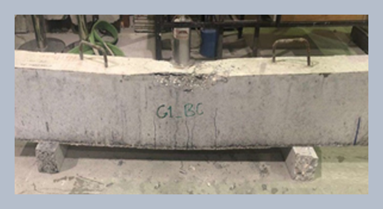 Behavior of reinforced concrete beams cast with a proposed geopolymer concrete (GPC) mix